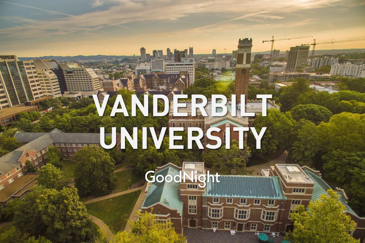 A scenic view of Vanderbilt University’s historic buildings and clock tower, backed by the surrounding cityscape and vibrant greenery. The tranquil campus atmosphere invites exploration and leisurely strolls, suggesting a welcoming environment for families to discover nearby.