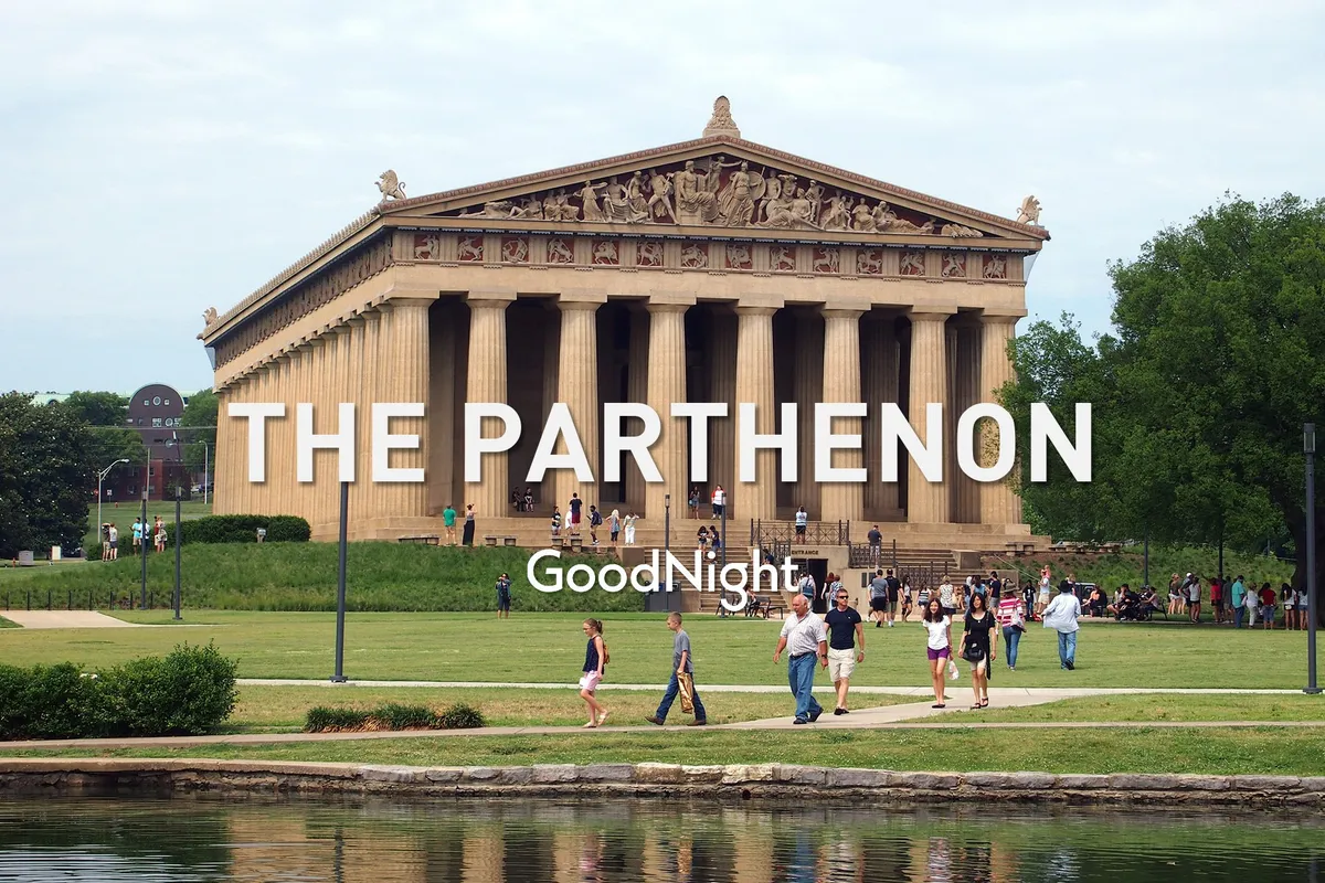 This image shows the striking full-scale replica of The Parthenon situated in the midst of Centennial Park, with visitors walking nearby and lush green lawns surrounding the iconic structure. Families and individuals can be seen enjoying the outdoor space, providing a clear sense of place and community engagement.