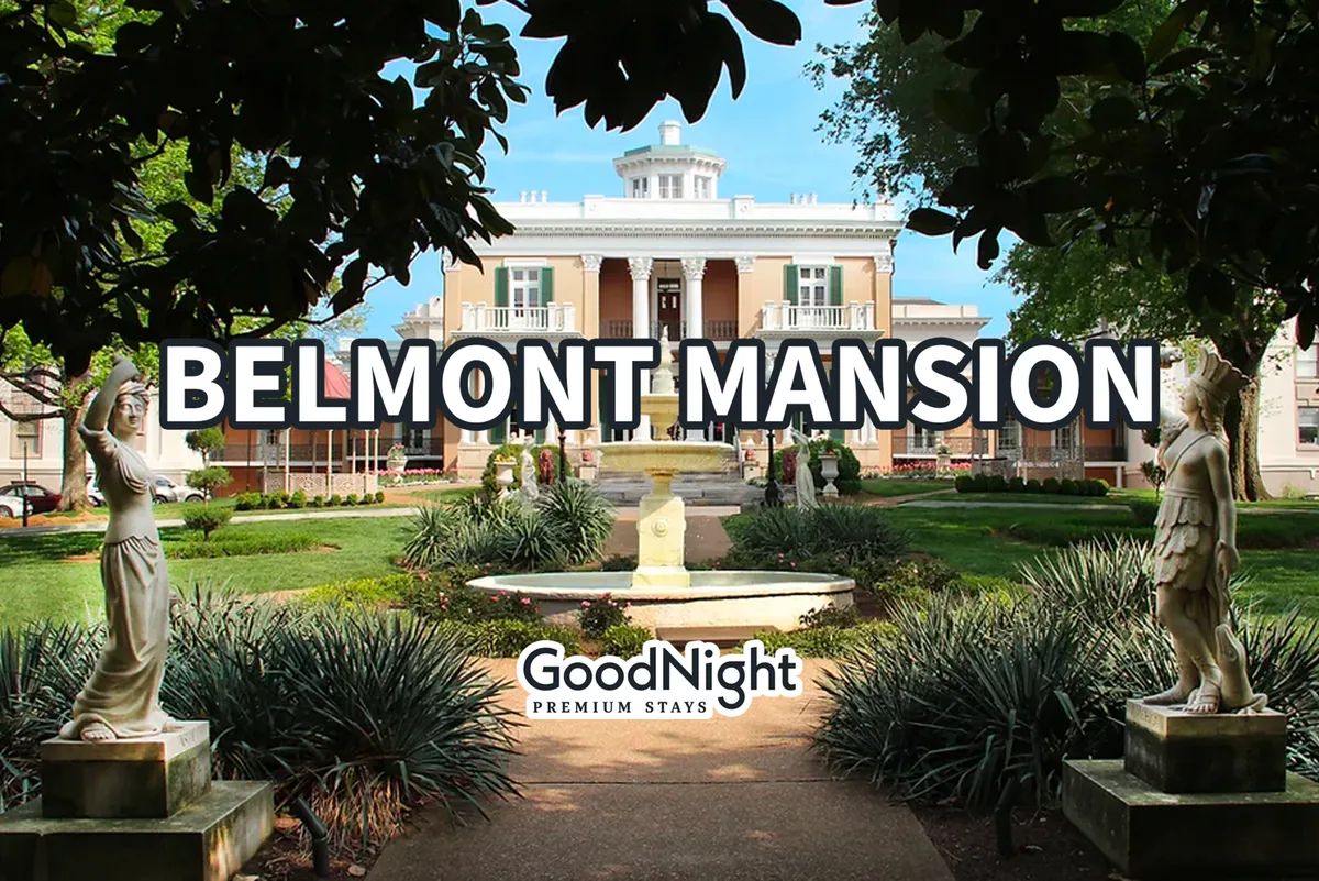 A tranquil exterior view of Belmont Mansion surrounded by lush greenery, a central fountain, and elegant statues. The manicured gardens and historic architecture create a refined and romantic atmosphere, perfect for couples seeking a peaceful stroll or memorable photo opportunity.
